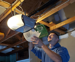 Technician Repairing Opener